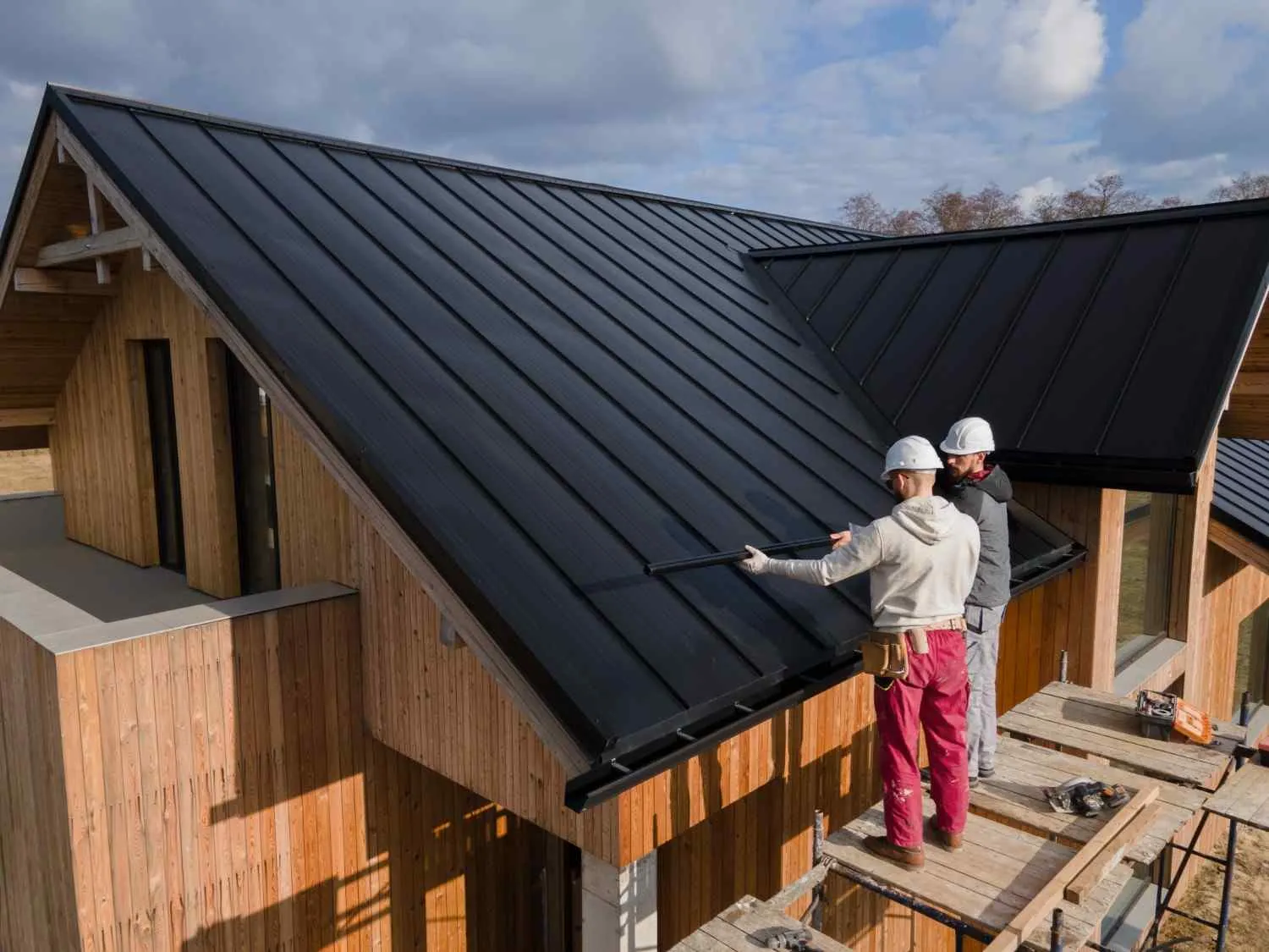Professional roofing team inspecting a roof